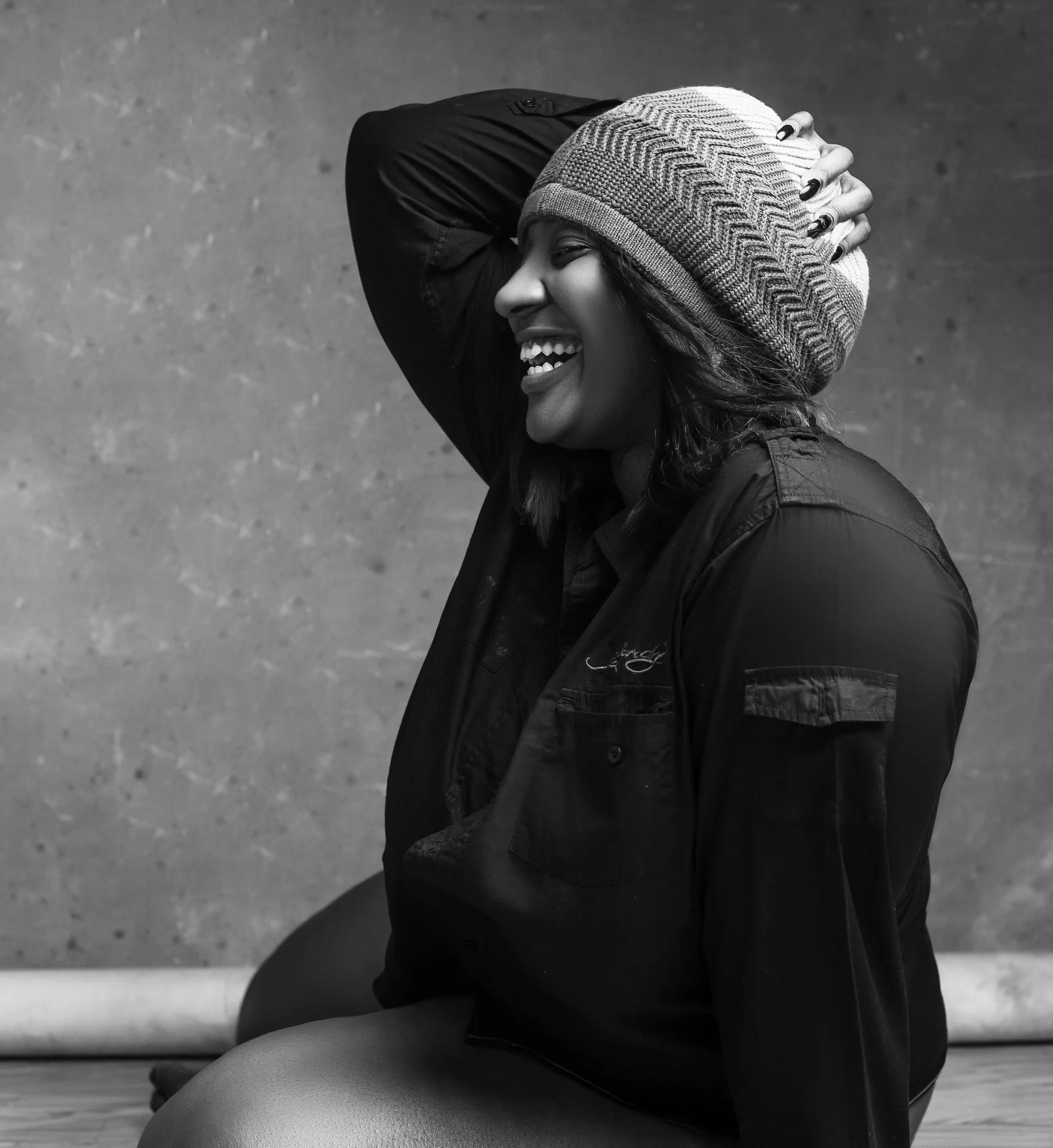 Woman laughing with a bright smile