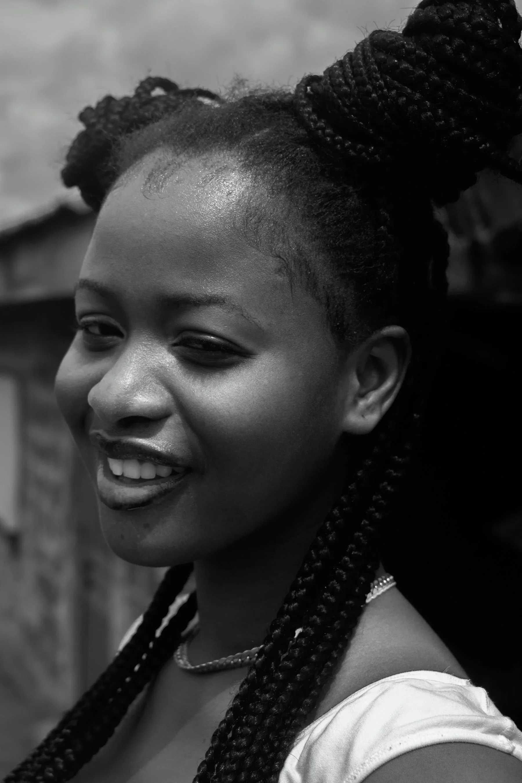 Woman smiling confidently in soft natural light